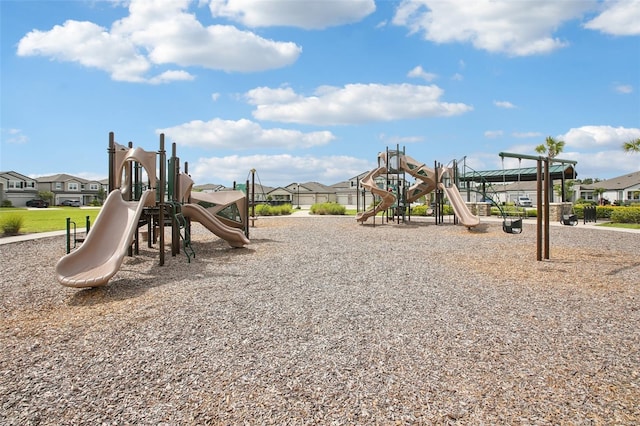 33157 Rosewood Bark Way, Wesley Chapel, FL 33545 - community jungle gym with a residential view