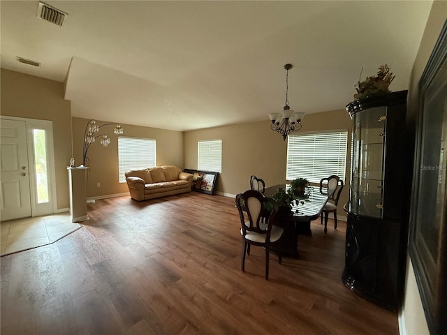 7201 Royal George Ct, Wesley Chapel, FL 33545 - dining room featuring a chandelier and wood finished floors
