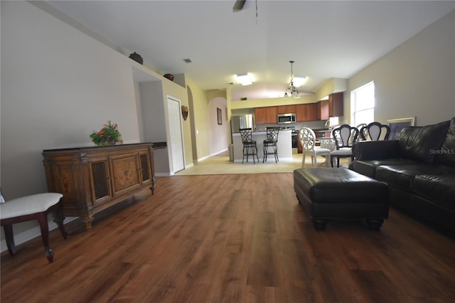 7201 Royal George Ct, Wesley Chapel, FL 33545 - living room with vaulted ceiling, light wood-type flooring, and ceiling fan