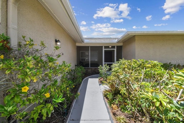 8030 San Bernardino Dr, Port Richey, FL 34668 - entrance to property featuring stucco siding