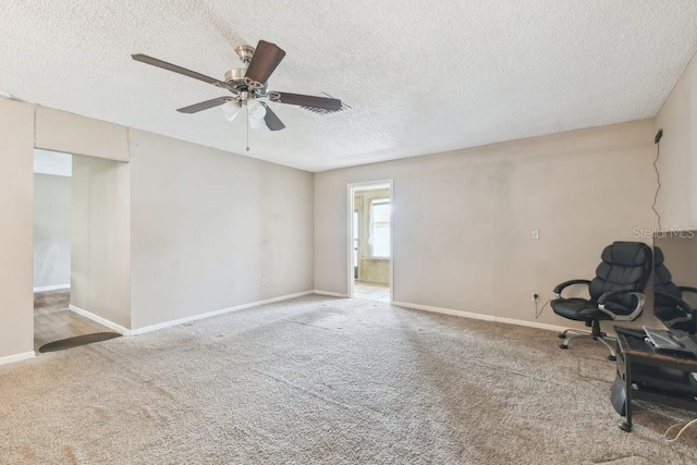 8030 San Bernardino Dr, Port Richey, FL 34668 - unfurnished room with a textured ceiling, carpet, and ceiling fan