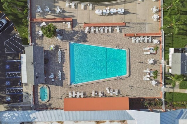8030 San Bernardino Dr, Port Richey, FL 34668 - drone / aerial view of a pool