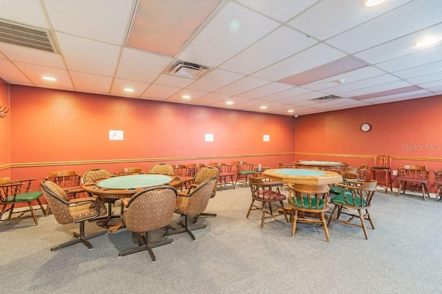 8030 San Bernardino Dr, Port Richey, FL 34668 - carpeted dining space featuring a paneled ceiling and recessed lighting