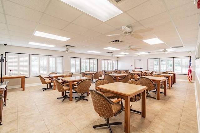 8030 San Bernardino Dr, Port Richey, FL 34668 - dining area with a drop ceiling and light tile patterned floors