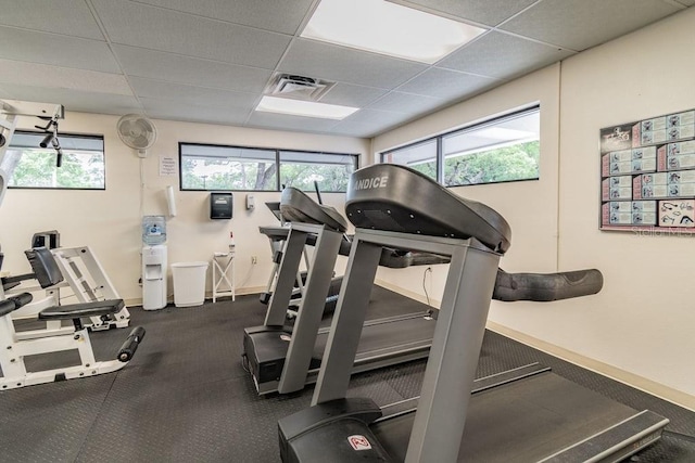 8030 San Bernardino Dr, Port Richey, FL 34668 - gym featuring a paneled ceiling