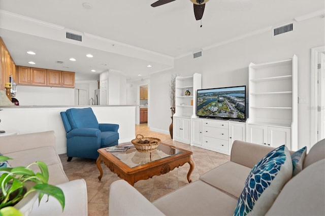 7296 Marathon Dr Unit 603, Seminole, FL 33777 - living room with light tile patterned flooring, ornamental molding, recessed lighting, and ceiling fan