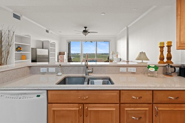7296 Marathon Dr Unit 603, Seminole, FL 33777 - kitchen featuring white dishwasher, crown molding, open floor plan, a ceiling fan, and light stone counters