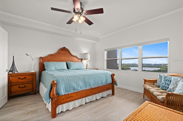 7296 Marathon Dr Unit 603, Seminole, FL 33777 - bedroom featuring light wood-type flooring, ceiling fan, and a water view
