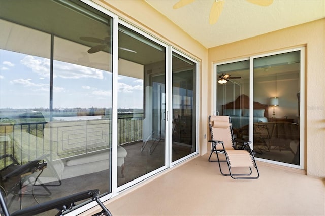 7296 Marathon Dr Unit 603, Seminole, FL 33777 - balcony featuring a ceiling fan