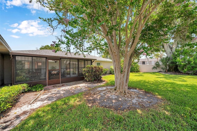 2182 Corinne Ct S Unit C, Saint Petersburg, FL 33712 - view of yard featuring a sunroom