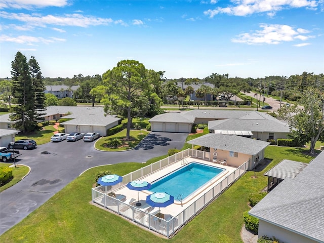 2182 Corinne Ct S Unit C, Saint Petersburg, FL 33712 - view of pool with a fenced backyard, a residential view, and a water slide