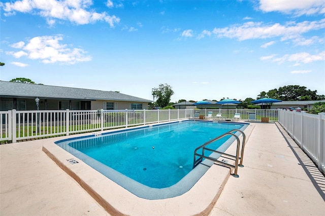 2182 Corinne Ct S Unit C, Saint Petersburg, FL 33712 - community pool featuring a patio