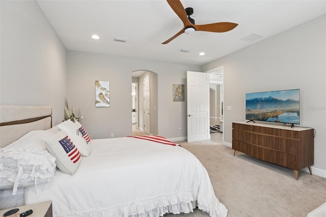 5426 Wayfarer Ave, Apollo Beach, FL 33572 - bedroom featuring arched walkways, light carpet, recessed lighting, and ceiling fan