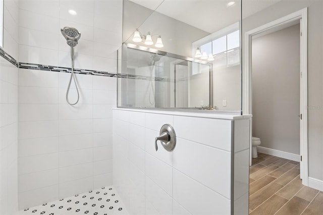 5426 Wayfarer Ave, Apollo Beach, FL 33572 - full bathroom with a walk in shower, wood finish floors, and vanity