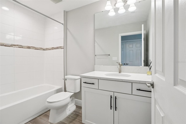5426 Wayfarer Ave, Apollo Beach, FL 33572 - bathroom with vanity, shower / tub combination, wood finish floors, and a chandelier
