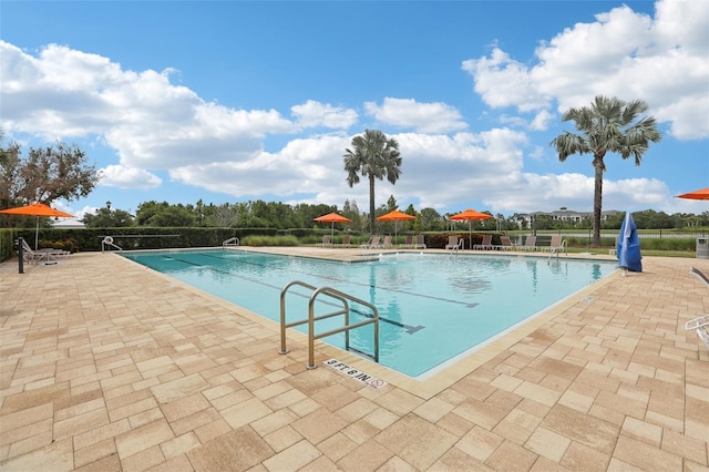 5426 Wayfarer Ave, Apollo Beach, FL 33572 - community pool featuring a patio area