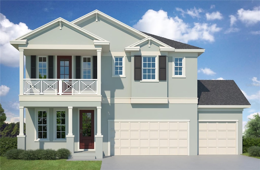 1711 W Aileen St, Tampa, FL 33607 - view of front of property with a balcony, driveway, stucco siding, and an attached garage