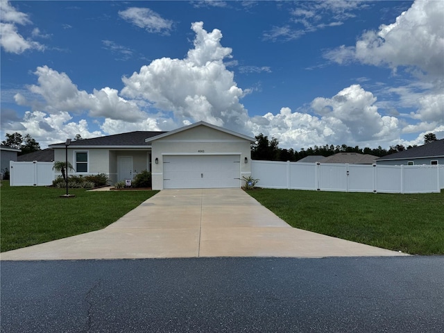 4043 SW 156th Pl, Ocala, FL 34473 - single story home featuring driveway, an attached garage, stucco siding, and a gate