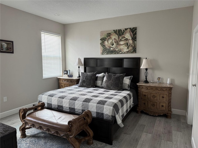 4043 SW 156th Pl, Ocala, FL 34473 - bedroom featuring light wood-type flooring and a textured ceiling