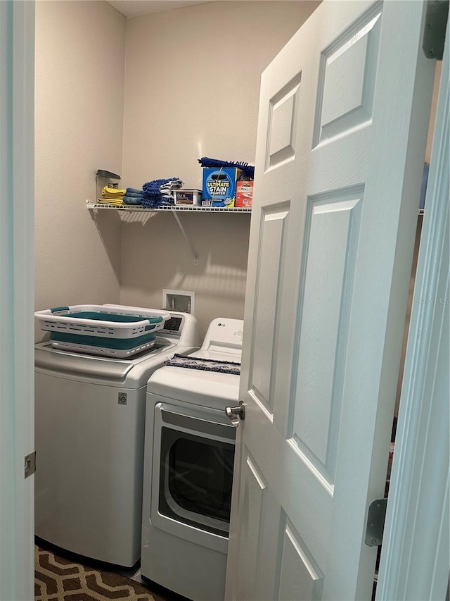 4043 SW 156th Pl, Ocala, FL 34473 - laundry room with washing machine and clothes dryer