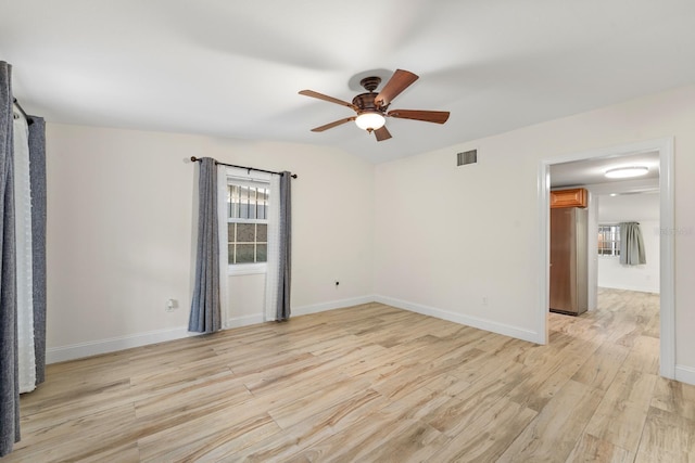 1905 E 99th Ave, Tampa, FL 33612 - empty room with light wood-type flooring and a ceiling fan
