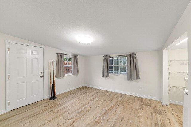 1905 E 99th Ave, Tampa, FL 33612 - foyer featuring wood finished floors and vaulted ceiling
