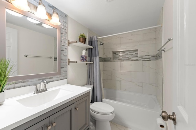 1905 E 99th Ave, Tampa, FL 33612 - bathroom with marble finish flooring, shower / bath combo with shower curtain, and vanity