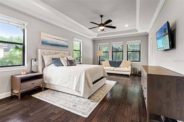 1507 Amarone Pl, Lutz, FL 33548 - bedroom featuring a tray ceiling, crown molding, dark wood finished floors, recessed lighting, and ceiling fan