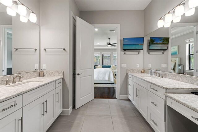 1507 Amarone Pl, Lutz, FL 33548 - ensuite bathroom featuring a ceiling fan, two vanities, and plenty of natural light