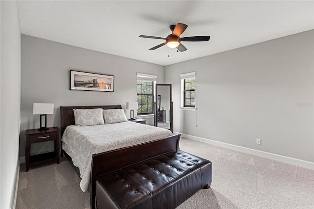 1507 Amarone Pl, Lutz, FL 33548 - carpeted bedroom with baseboards and ceiling fan