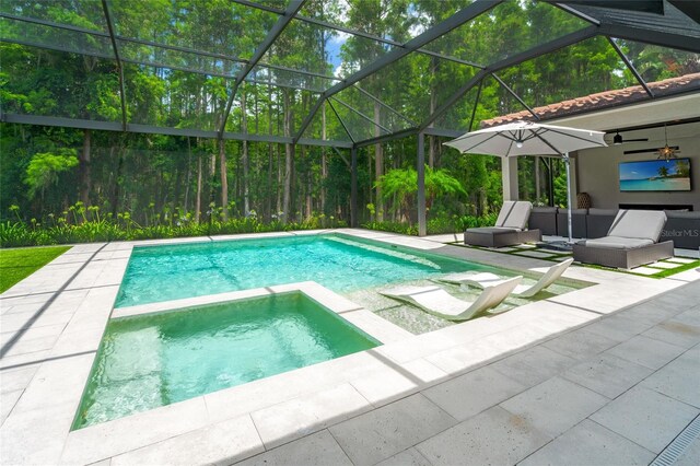 1507 Amarone Pl, Lutz, FL 33548 - view of pool with a patio area, a pool with connected hot tub, glass enclosure, an outdoor hangout area, and ceiling fan
