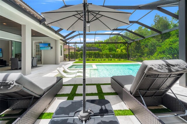 1507 Amarone Pl, Lutz, FL 33548 - view of pool with a patio, glass enclosure, a pool with connected hot tub, and an outdoor hangout area