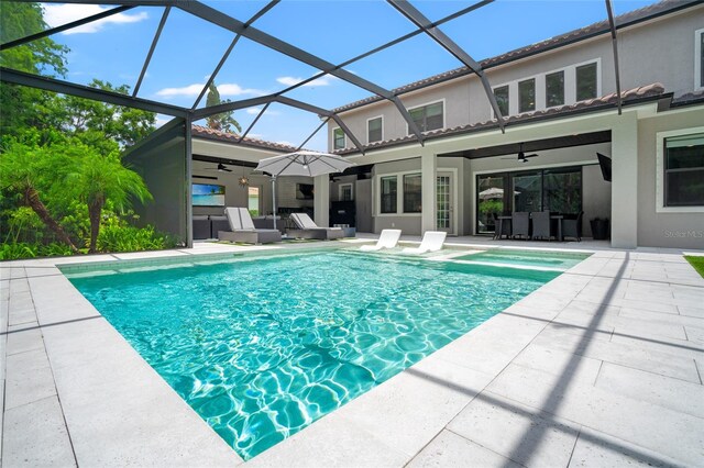1507 Amarone Pl, Lutz, FL 33548 - view of pool with a ceiling fan, a patio area, an outdoor living space, and glass enclosure
