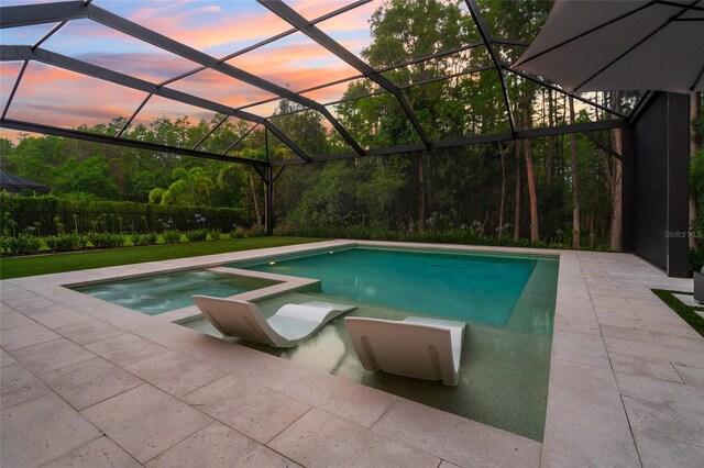 1507 Amarone Pl, Lutz, FL 33548 - view of pool with a pool with connected hot tub, a lanai, and a patio