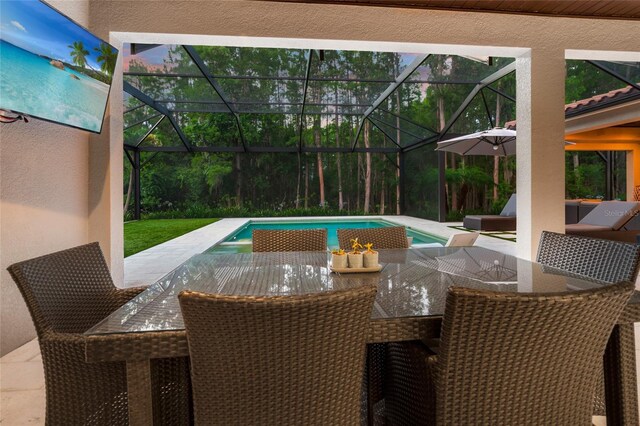1507 Amarone Pl, Lutz, FL 33548 - view of patio / terrace with outdoor dining space, glass enclosure, and an outdoor pool