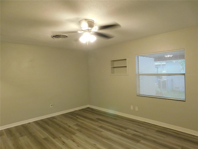 507 Francis Blvd, Lakeland, FL 33801 - empty room featuring a ceiling fan and wood finished floors