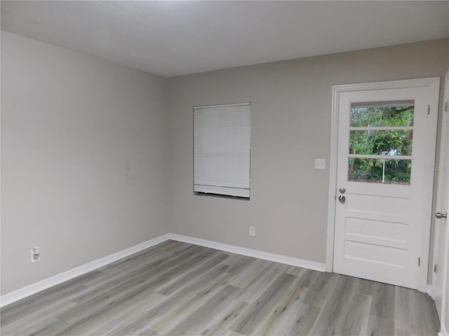 507 Francis Blvd, Lakeland, FL 33801 - unfurnished room featuring light wood-style flooring and baseboards