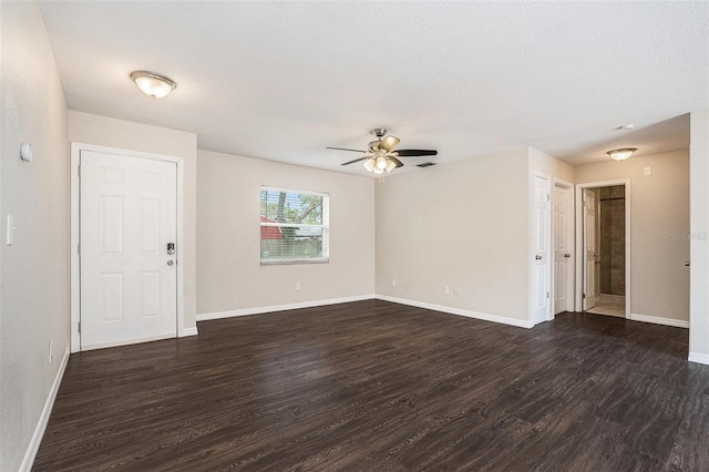 6601 N Elizabeth St, Tampa, FL 33604 - empty room featuring dark wood-style floors and a ceiling fan