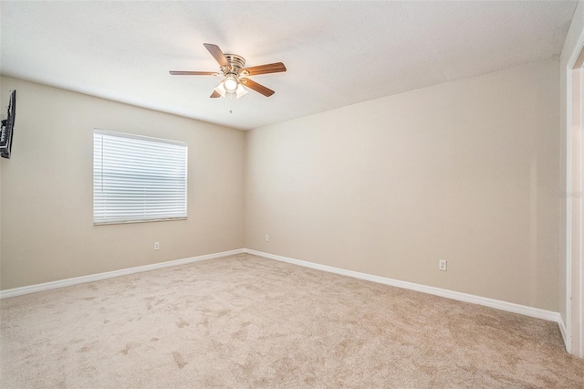 6601 N Elizabeth St, Tampa, FL 33604 - unfurnished room featuring carpet floors and a ceiling fan