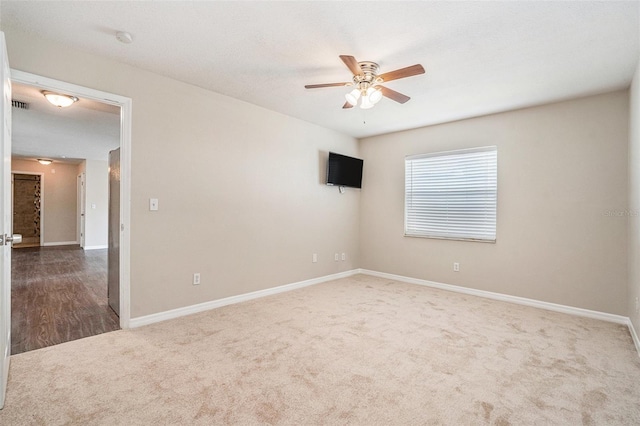 6601 N Elizabeth St, Tampa, FL 33604 - carpeted empty room with a ceiling fan and a smoke detector