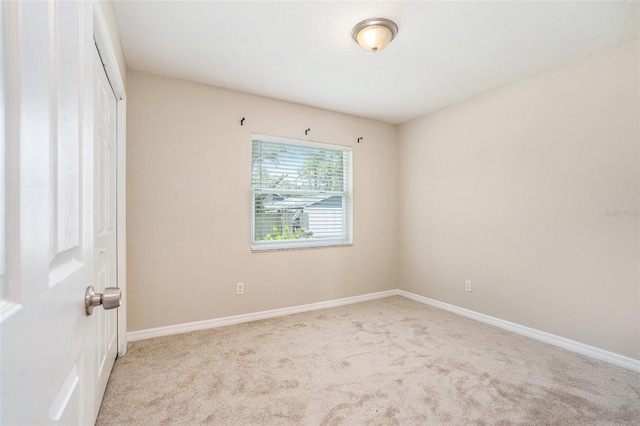 6601 N Elizabeth St, Tampa, FL 33604 - carpeted spare room featuring baseboards
