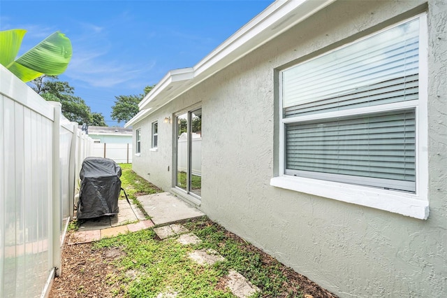 6601 N Elizabeth St, Tampa, FL 33604 - view of home's exterior featuring stucco siding