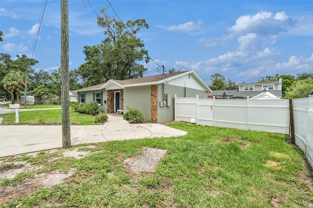 6601 N Elizabeth St, Tampa, FL 33604 - rear view of property with stucco siding