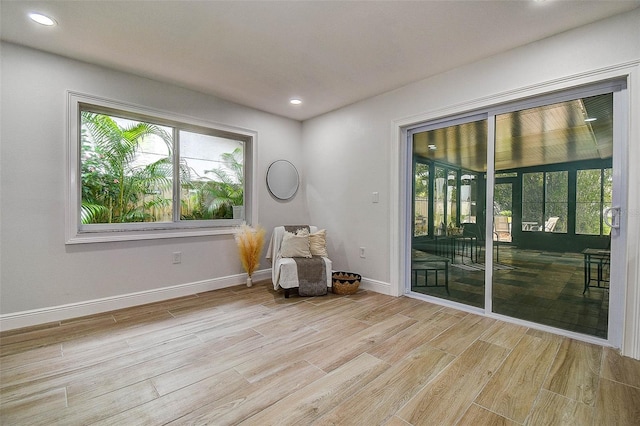 10900 65th Way N, Pinellas Park, FL 33782 - living area with light wood finished floors and recessed lighting