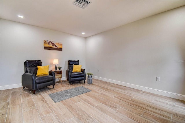 10900 65th Way N, Pinellas Park, FL 33782 - living area featuring light wood-style flooring and recessed lighting