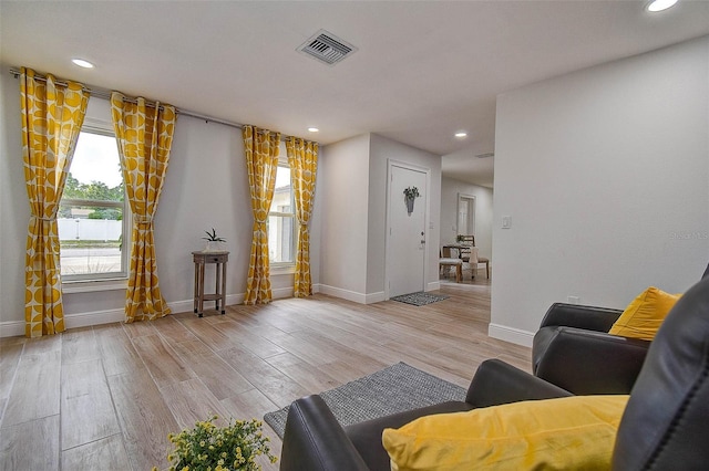 10900 65th Way N, Pinellas Park, FL 33782 - living area with light wood-style flooring and recessed lighting