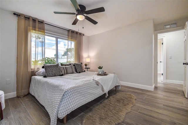 10900 65th Way N, Pinellas Park, FL 33782 - bedroom featuring wood finished floors and ceiling fan