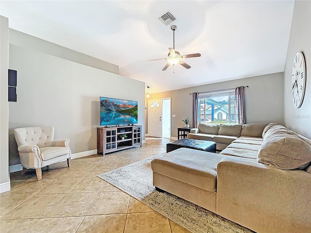 1437 Stonehenge Way, Palm Harbor, FL 34683 - living room featuring light tile patterned floors, ceiling fan, and vaulted ceiling