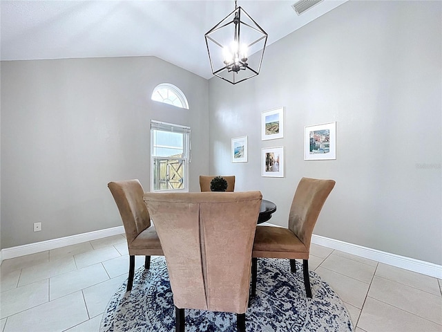 1437 Stonehenge Way, Palm Harbor, FL 34683 - dining area featuring a chandelier, light tile patterned floors, and high vaulted ceiling