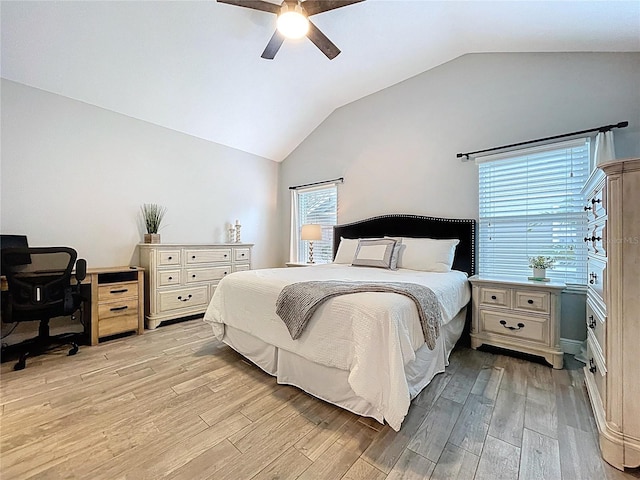 1437 Stonehenge Way, Palm Harbor, FL 34683 - bedroom with light wood finished floors, lofted ceiling, ceiling fan, and an office area